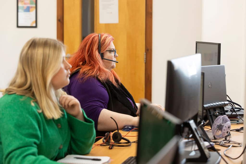 Team member on the phone to a loan customer