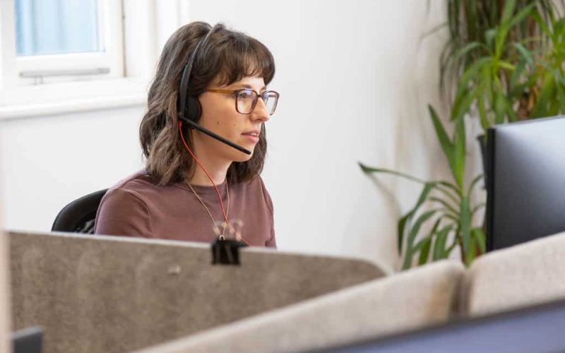 Team member on the phone to a loan customer