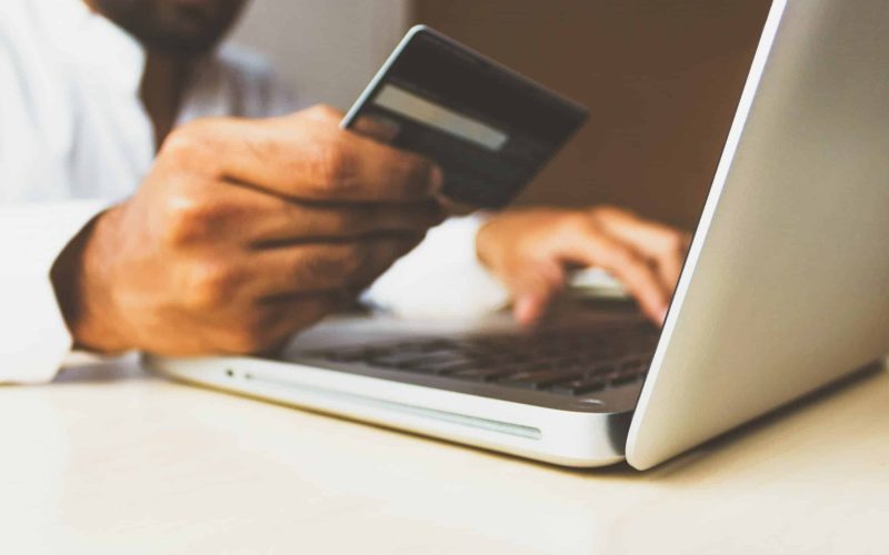 Laptop-with-bank-card-scaled-1